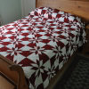 Hunter Star quilt in red and white, as requested by Stuart, Barbara's brother. We hope he and Margaret like it. We chose the fabrics so might not be there idea of red and white.