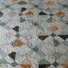 Margiolds quilt pattern using a number charm packages Barbara has had for a few years.