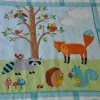 A baby quilt for Lexsa Brooke based on Woodland Friends flannel panel by Northcott.