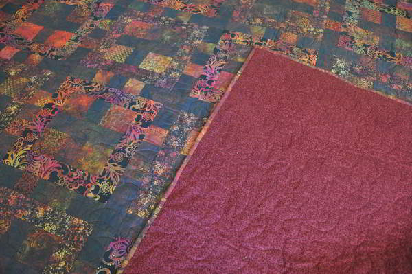 Shot of quilt showing backing fabric